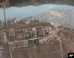 FILE - Satellite image provided by GeoEye shows the area around the Yongbyon nuclear facility in Yongbyon, North Korea.