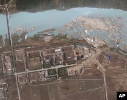 FILE - satellite image provided by GeoEye shows the area around the Yongbyon nuclear facility in Yongbyon, North Korea.