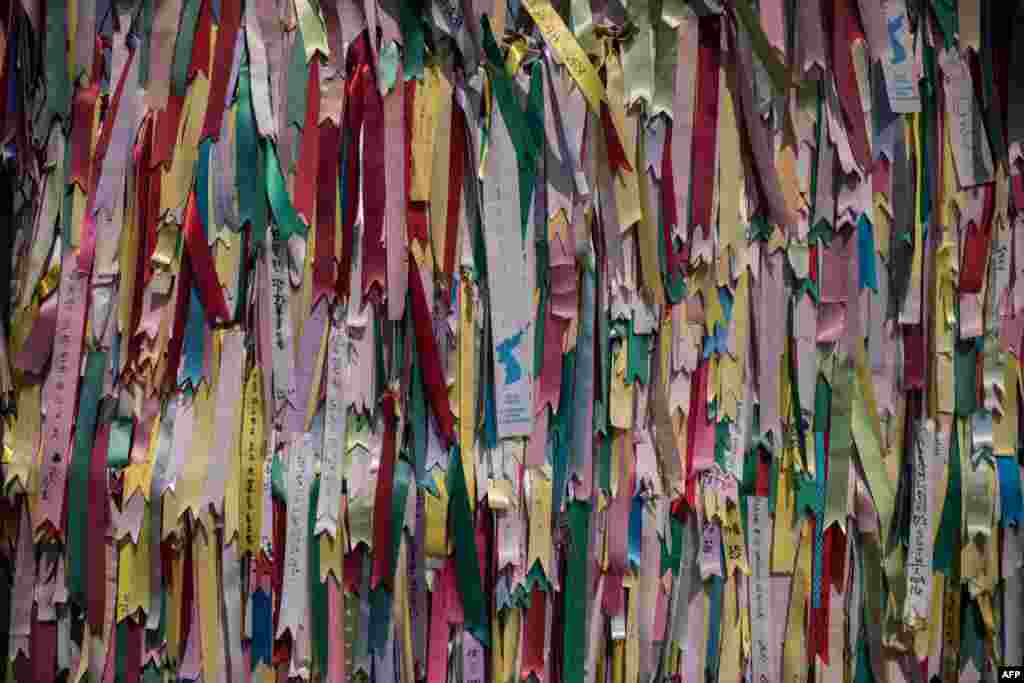 Ribbons featuring messages are displayed on a fence at the Imjingak Peace Park near the Demilitarized Zone (DMZ) separating North and South Korea in Paju. Washington&#39;s top diplomat, Secretary of State Rex Tillerson, visited the Demilitarized Zone dividing the two Koreas to gaze on the North for himself, a day after he declared 20 years of efforts to denuclearize it had failed.