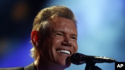 Randy Travis performs on day 2 of the 2013 CMA Music festival at the LP Field in Nashville, Tenn., June 7, 2013.
