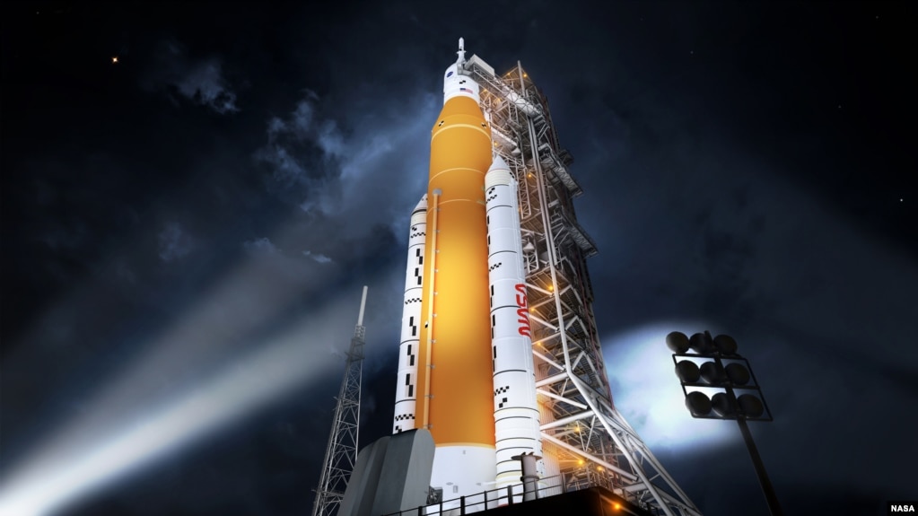 This illustration shows NASA’s new rocket, the Space Launch System (SLS), in its Block 1 crew vehicle setup that will send astronauts to the Moon on the Artemis missions. (Image Credit: NASA)