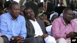 Kenya's Finance Minister Uhuru Kenyatta (L), Kenya's Vice President Kalonzo Musyoka (C) and suspended Higher Education Minister William Ruto (R) attend a prayer meeting at the Uhuru Park grounds in the capital Nairobi, April 11, 2011.