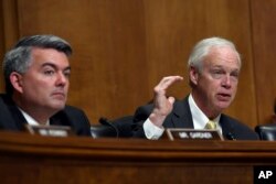 Sen. Ron Johnson, R-Wis. (R), sitting next to Sen. Cory Gardner, R-Colo., asks question of Secretary of State Mike Pompeo as he testifies before the Senate Foreign Relations Committee on Capitol Hill in Washington, April 10, 2019.
