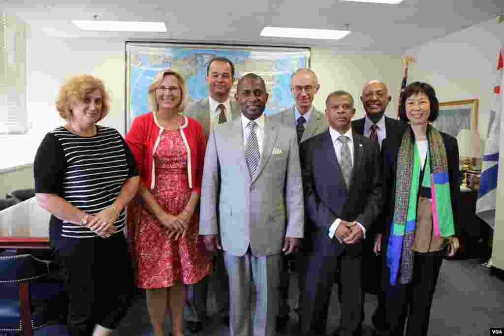 Sao Tome Prime Minister Gabriel Costa and his staff pose with VOA senior management.
