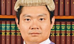 香港高等法院法官李运腾驳回港区国安法首名被告唐英杰，就被控煽动分裂及恐怖活动罪审讯不设陪审团的司法覆核，认为陪审团并非被告宪制权利 (照片来源：香港司法机构)