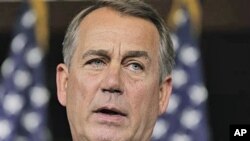 House Speaker John Boehner of Ohio speaks with reporters on Capitol Hill in Washington, DC, June 23, 2011