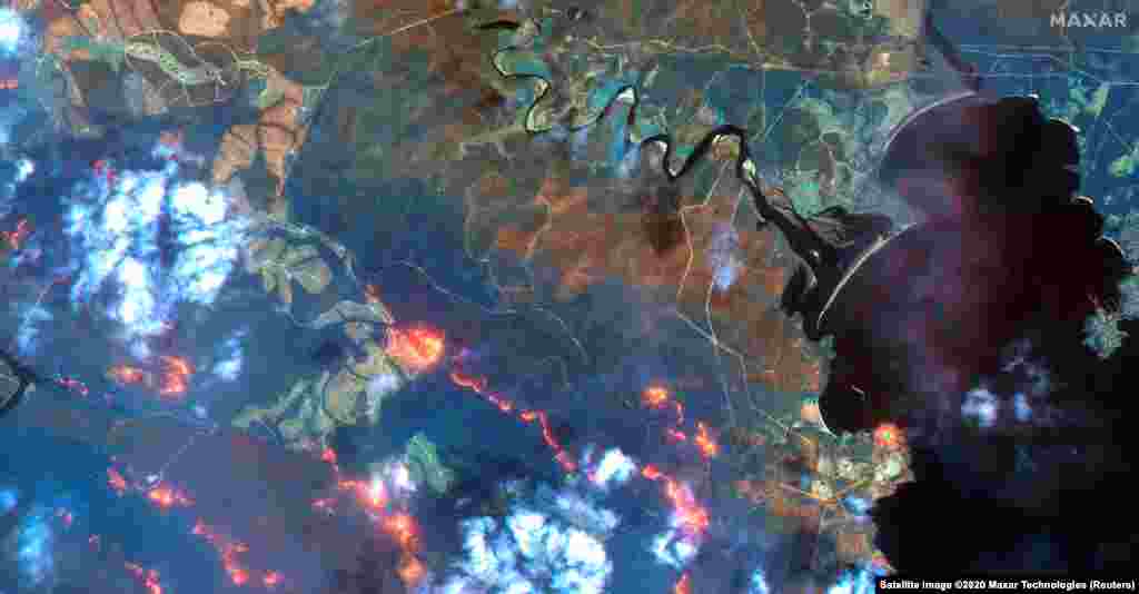 This image shows fire lines south of Eden, New South Wales, Australia, in this handout Maxar&#39;s WorldView-3 satellite image taken on Jan. 12, 2020.