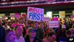 Supporters of Republican presidential candidate Donald Trump listen to him speak during a campaign rally at Lackawanna College, Nov. 7, 2016, in Scranton, Pa. 