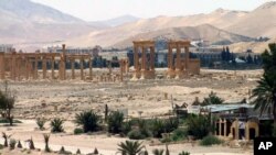FILE - This file photo released on Sunday, May 17, 2015, by the Syrian official news agency SANA, shows the general view of the ancient Roman city of Palmyra, northeast of Damascus, Syria. 