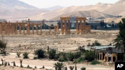 FILE - This file photo released on Sunday, May 17, 2015, by the Syrian official news agency SANA, shows the general view of the ancient Roman city of Palmyra, northeast of Damascus, Syria. 