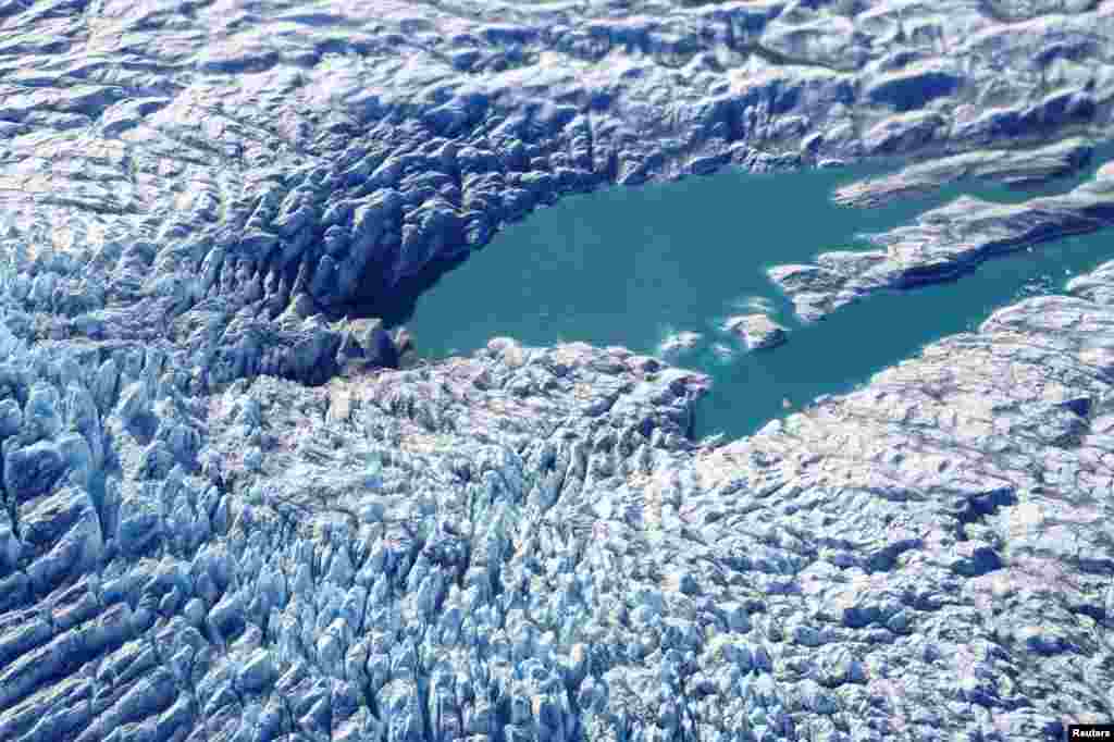 An aerial view shows geological formations as recorded by NASA&#39;s IceBridge Operation near Kangerlussuaq, Greenland.