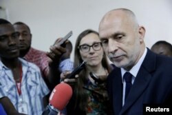 Oxfam International Regional Director for Latin America, Simon Ticehurst, and Oxfam Intermon Executive Affiliate Unit head, Margalida Massot, speak with journalists after a meeting with Haiti's Minister of Planning and External Cooperation Aviol Fleurant