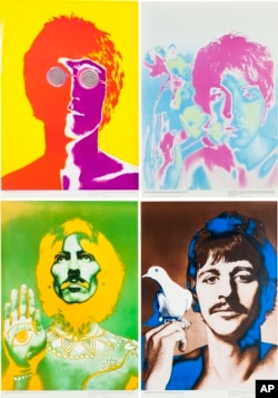 This undated photo provided by Heritage Auctions from an upcoming Beatles collection sale shows a set of four psychedelic posters by Richard Avedon commissioned by the German magazine Stern in 1966, which will be auctioned in New York on Sept. 19.