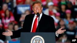 FILE - President Donald Trump speaks during a rally at Southern Illinois Airport in Murphysboro, Ill.