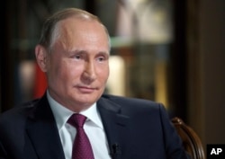 FILE - Russian President Vladimir Putin speaks during an interview with NBC News' Megyn Kelly in Kaliningrad, Russia, March 2, 2018.
