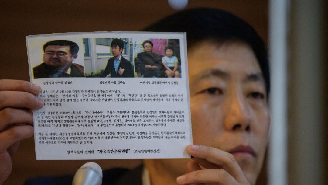 Anti-North Korea activist Park Sang-hak of Fighters for Free North Korea holds a leaflet of the type he sends into North Korea, as he attends a press conference in Seoul on July 6, 2020.