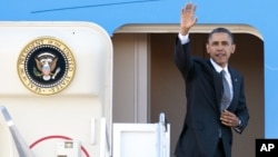 Presidente Obama à partida para périplo asiático