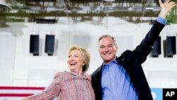 Democratic presidential candidate Hillary Clinton and Sen. Tim Kaine, D-Va., participate in a rally at Northern Virginia Community College in Annandale, Virginia, July 14, 2016.