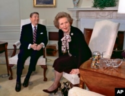 Then-British Prime Minister Margaret Thatcher meets with President Ronald Reagan during a visit to the White House, Feb. 20, 1985.