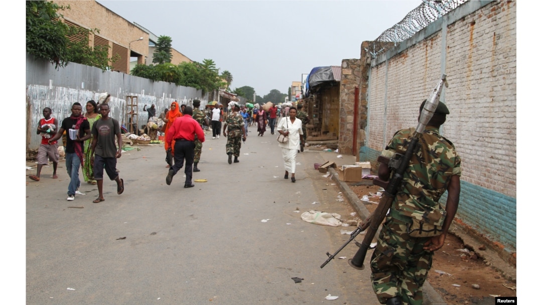 FILE - A soldier patrols the streets after a grenade attack of Burundi's capital Bujumbura, Feb. 3, 2016.