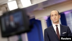 FILE - Senior White House Adviser Stephen Miller waits to go on the air in the White House Briefing Room in Washington, Feb. 12, 2017.