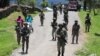 Pasukan keamanan berpatroli di Ilaga, Kabupaten Puncak di Papua, 30 September 2019. (Foto: Sevianto Pakiding/Antara Foto via Reuters)