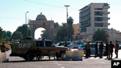 Iraqi Security forces close the heavily fortified Green Zone as they tightened security measures hours after the assassination attempt on the Prime Minister in Baghdad, Iraq, Nov. 7, 2021. 