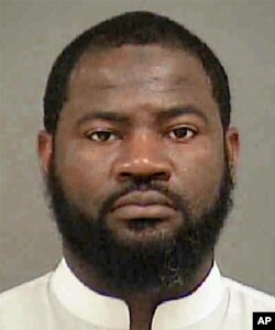 This undated photo provided by the Mecklenburg County Sheriff's Office in Charlotte, N.C., shows Erick Jamal Hendricks. Accused of trying to recruit people to join the Islamic State group, Hendricks was arrested, Aug. 4, 2016, in Charlotte, N.C.
