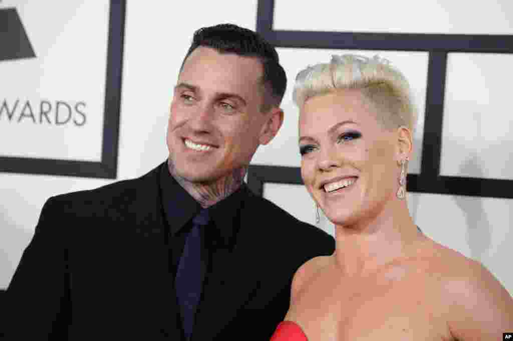 Carey Hart, left, and Pink arrive at the 56th annual GRAMMY Awards at Staples Center on Jan. 26, 2014, in Los Angeles.