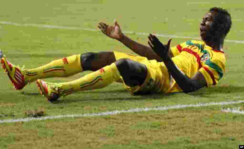 Mali's Modibo Maiga reacts after being fouled during their final African Cup of Nations Group D soccer match against Botswana at the Stade De L'Amitie Stadium in Libreville February 1, 2012.