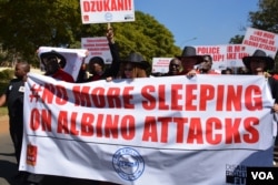 FILE - Petitioners march to Malawi parliament to protest attacks on Albinos in the country. (Photo: L. Masina/VOA)