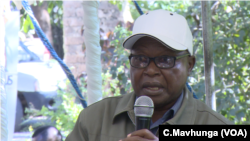 Ronnie Masango, who grows tobacco, spoke at the public meeting in Chinhoyi, Zimbabwe, May 10, 2019.