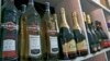 File - Bottles of alcohol are displayed in a liquor shop at Wuse Market in Abuja, Nigeria.