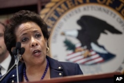 U.S. Attorney General Loretta Lynch announces an indictment against nine FIFA officials and five corporate executives for racketeering, conspiracy and corruption at a news conference, May 27, 2015, in the Brooklyn borough of New York.