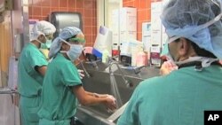 Hospital doctors take the simple step of hand washing to prevent the spread of staph infections like MRSA