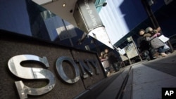 FILE - Sony's logo is displayed outside the Sony building in Tokyo's Ginza shopping district, Dec. 18, 2014.