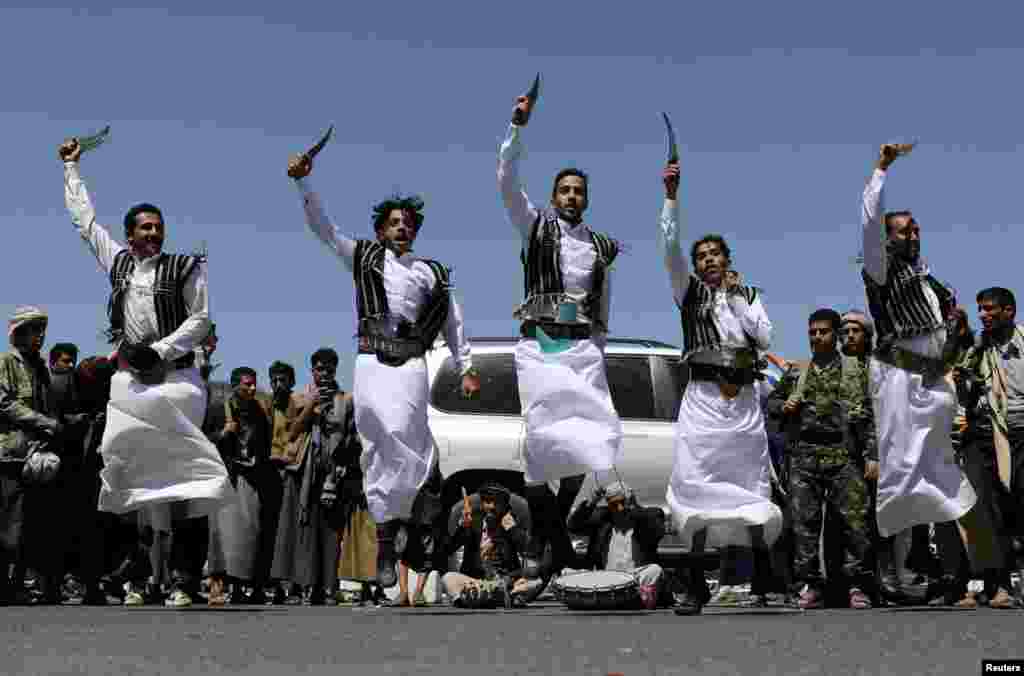 Houthi supporters perform the traditional Baraa dance during a ceremony held to collect supplies for Houthi fighters in Sana&#39;a, Yemen.