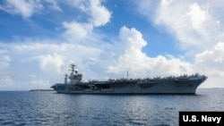美國尼米茲號航母2020年6月24日停靠關島（美國海軍照片）