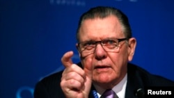 FILE - Retired U.S. Army General Jack Keane answers a question during a panel discussion at the SALT conference in Las Vegas, May 15, 2014. 