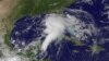 This NOAA satellite image shows shower and thunderstorm activity developing around an area of low pressure spinning in the Gulf of Mexico, June 23, 2012.
