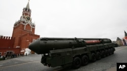 FILE - In this Tuesday, May 9, 2017 file photo, a Russian Topol M intercontinental ballistic missile launcher rolls along Red Square during the Victory Day military parade to celebrate 72 years since the end of WWII and the defeat of Nazi Germany, in Moscow, Russia.