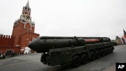 FILE - In this May 9, 2017 file photo, a Russian Topol M intercontinental ballistic missile launcher rolls along Red Square during a Victory Day military parade in Moscow. 