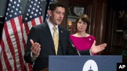 FILE - House Speaker Paul Ryan of Wisconsin, accompanied by Rep. Cathy McMorris Rodgers, R-Wash., takes questions from reporters at Republican National Committee Headquarters in Washington, May 17, 2017.