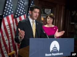 House Speaker Paul Ryan of Wisconsin, accompanied by Rep. Cathy McMorris Rodgers, R-Wash., takes questions from reporters at Republican National Committee Headquarters in Washington, May 17, 2017.