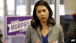 In this photo taken Oct. 18, 2016, Florida Democratic Congressional candidate Stephanie Murphy meets with voters at a senior center in Altamonte Springs, Florida. Murphy went on to become the first Vietnamese-American woman to be elected to Congress. 