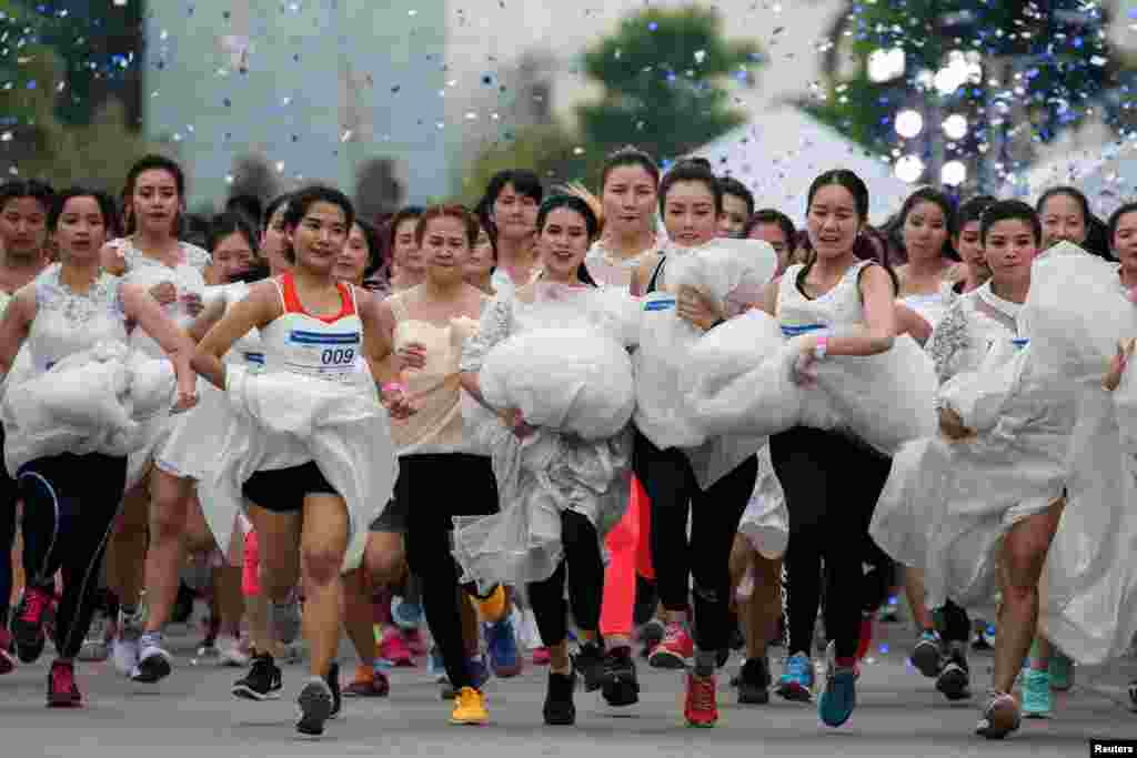 Brides-to-be participate in the &quot;Running of the Brides&quot; race, in Bangkok, Thailand, Dec. 2, 2017.