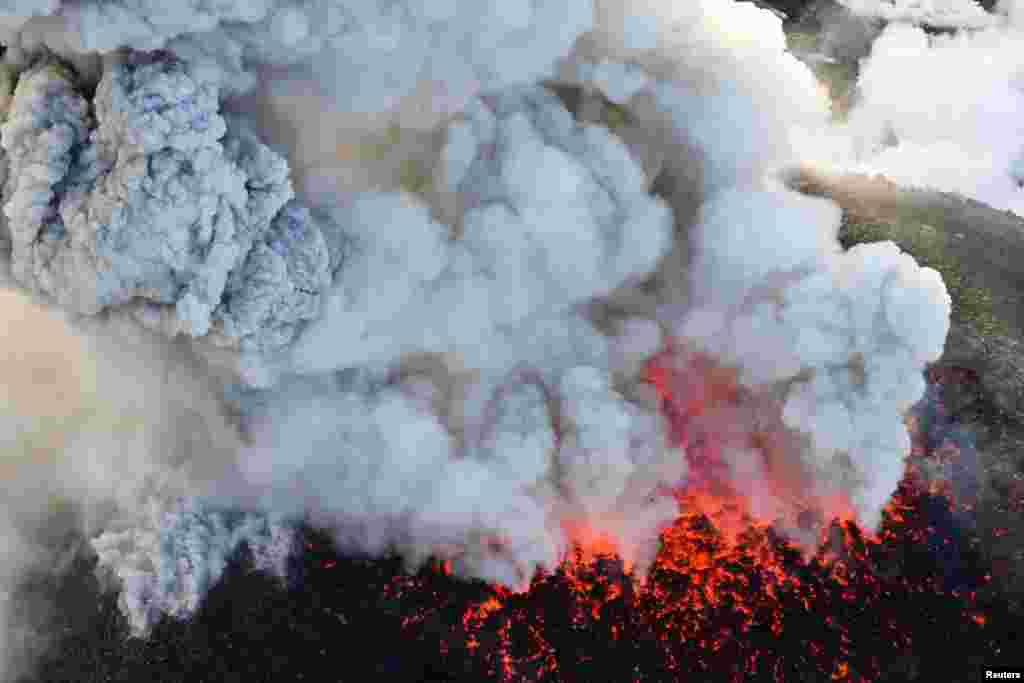 An aerial view shows Shinmoedake peak erupting between Miyazaki and Kagoshima prefectures, southwestern Japan. (Courtesy: Kyodo/via Reuters)