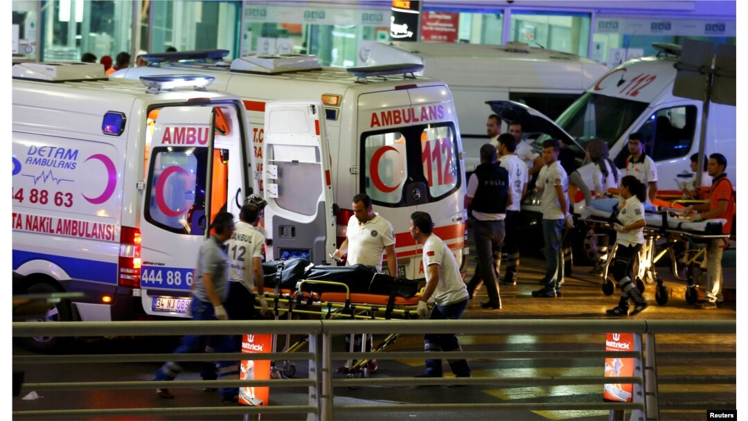 Paramedics push a stretcher at Turkey's largest airport, Istanbul Ataturk, following a blast in Turkey, June 28, 2016.