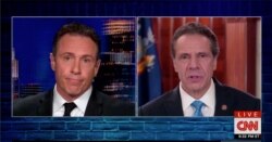 Chris Cuomo (L) interviews his brother, Governor Mario Cuomo of New York, on his CNN news program.