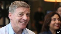 New Zealand Prime Minister Bill English talks to the media at his hotel in Auckland, New Zealand, Sept. 23, 2017.